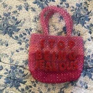 Skinny dip beaded stop being jealous bag
